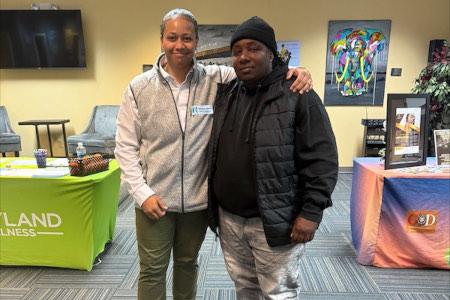 People in an anonymous addiction recovery group meeting.